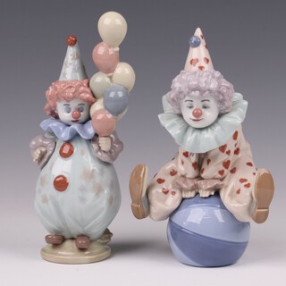 Two Lladro figures - Having a Ball 5813 17cm and Little Clown 5811 17cm  