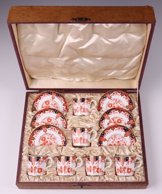 A Royal Crown Derby  12 piece Imari pattern coffee service of 6 coffee cans (1 cracked)  and 6 saucers, bases of saucers impressed Derby 12.0F, cased 