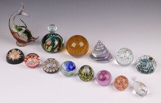 A Mdina glass paperweight 10cm, a Whitefriars paperweight 7cm, a Norsk fish 8cm and 12 other various paperweights