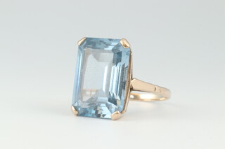 A 9ct gold and blue topaz set ring, size P 1/2, 1.8cm x 7mm, 6.4 grams