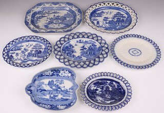 Rogers, a 19th Century blue and white transfer decorated dish decorated a farm house and deer 23cm, a Turner blue and white Willow pattern bowl 31cm (cracked) and 5 19th Century blue and white oval ribbon ware dishes (2 cracked)  