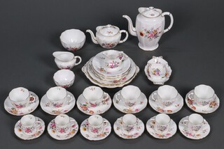 A 38 piece Royal Crown Derby posy pattern tea/coffee service, of differing dates, comprising twin handled plate, two large plates, 6 tea plates (3 cracked), 6 tea cups (4 cracked), 6 saucers, coffee pot, teapot, sugar bowl (cracked), milk jug, large and smalls sugar bowls, boat shaped dish, square dish, 6 coffee cans (1 cracked), 6 saucers (3 cracked) 