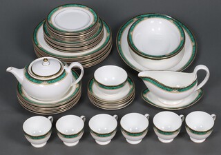 A Wedgwood Bi-Centenary Celebration Lambourne pattern dinner/tea service comprising oval meat plate, 2 oval dishes, 9 dinner plates, 8 side plates, 8 tea plates, 7 bowls, sauce boat and stand, teapot, sugar bowl, 6 cups, 6 saucers 
