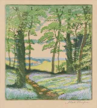 John Hall Thorpe (1874-1947), Bluebell Wood, woodcut in colours, signed in pencil, 19cm x 17cm, within an ebonized frame.