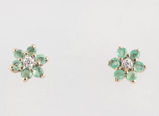 A pair of gold marked 375, diamond and emerald earrings cluster earrings, 1.1 grams