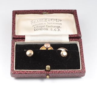 A pair of 9ct gold dress studs and 1 other (misshapen), 2.5 grams