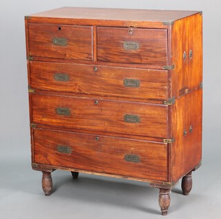 A 19th Century camphor campaign secretaire chest, the upper section fitted 2 short drawers, the right side being a secretaire drawer fitted pigeon holes above 1 long drawer, the base fitted 3 long drawers, raised on later turned feet 122cm h x 101cm w x 53cm d 