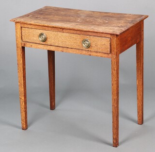 An 18th Century oak side table fitted a frieze drawer with brass ring drop handles, raised on square tapered supports 65cm h x 68cm w x 42cm d 