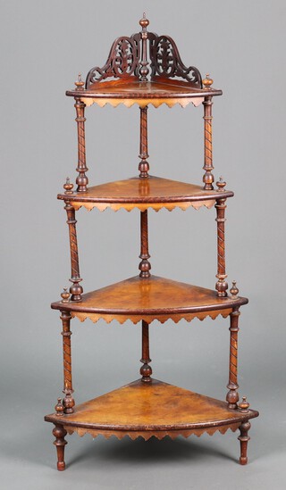 A Victorian figured walnut 4 tier corner what-not with pierced gallery 130cm h x 64cm w x 44cm d 
