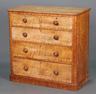 A Victorian bleached sycamore chest of 2 short and 3 long drawers with turned handles, raised on a platform base with 2 metal plates to the back 104cm h x 106cm w x 55cm d  