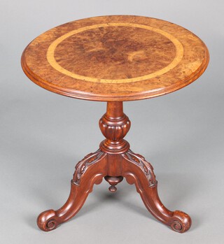 A Victorian quarter veneered and inlaid figured walnut occasional table, on a carved column and tripod base 47cm h x 50cm diam. 