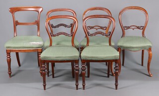 A harlequin set of 5 Victorian balloon back dining chairs, three rosewood with turned supports, two mahogany on cabriole supports, all with overstuffed seats together with a bar back chair (upholstery damaged)