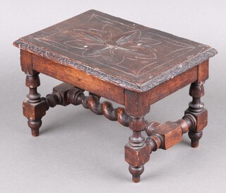 A Victorian rectangular carved oak stool raised on turned supports with H framed stretcher 18cm h x 29cm w x 20cm d 