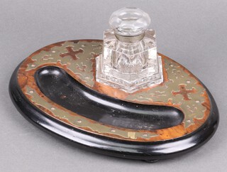 A Victorian hexagonal moulded glass inkwell on a walnut and brass mounted standish with pen receptacle, raised on bun feet 12cm h x 31cm w x 22cm d 