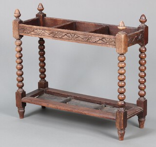 A Victorian rectangular carved oak 3 division umbrella stand on bobbin turned supports 66cm h x 77cm w x 28cm d 