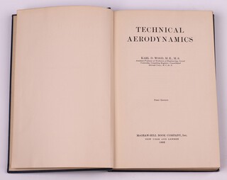 WOOD Karl D.  Technical Aerodynamics.  New York: McGraw-Hill Book Company, Inc. 1935.  8vo, 320pp.   Original blue cloth with gilt lettered spine.  Fading to spine and cover, minor rubbing to corners and edges of spine.   First Edition.  Initialled B.N.W. 1936

