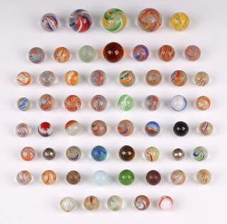 A collection of marbles belonging to Sir Barnes Wallis' daughter, Elisabeth Gaunt (now 93). These marbles were famously used by Wallis during his garden experiment in April 1942 whilst developing the conceptual principles behind the Dam Busters 'bouncing bomb'.  

Of the day Elisabeth recalls "I remember the Easter bank holiday weekend when Daddy came home with a strange device and placed it in front of a metal wash tub that he had filled with water in the garden.  He then asked if he could borrow my marbles for an experiment.  I was fiercely protective of my marbles but reluctantly agreed, I was very worried in case any of my precious marbles were lost, sadly some of them did get chipped."

Elisabeth's late sister Mary Stopes-Roe, also reflected on these formative experiments, recalling "We had this wonderful experiment at our family home, where my father set up the washtub and got a catapult made by his department.  He altered the angle of the slant at which the ball was delivered and the distance from the water, and then he bounced my sister's marbles, which she has never forgotten, the fact that they were her marbles."

Mrs Gaunt has displayed the marbles over the years at various events and they have always been in her possession.