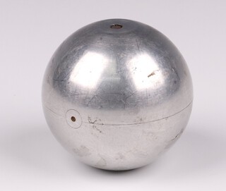 A 2 inch aluminium sphere of the type used in the Teddington ship tanks during the development of the Golf Mine 'bouncing bomb'. Discovered in a box of Sir Barnes Wallis' lectures slides on the 'Dam Busters' raId, the spheres were the next evolutionary step after the garden marbles leading eventually to the  development of the Highball and Upkeep bombs.

Between 9 June and 10 September 1942, Wallis made use of one of the two large indoor water tanks of  The National Physical Laboratory at Teddington on at least 18 occasions,  he stated "I moored a wax model of a battleship several hundred feet up the tank, broadside on. We fired 2in diameter  balls at it, when of course after hitting the freeboard of the ship, the sinking velocity of the ball combined with back-spin to move it towards the ship, and by adjusting the mean density of the ball we were able to pass it right underneath 'the soft underbelly', to quote Winston Churchill