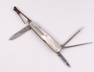 A Sheffield stainless steel pocket knife by Southern and Richardson having mother of pearl handle and blade stamped Immaculate Stainless (found within the Tallboy bomb model whilst cataloguing).