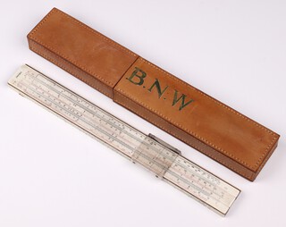 A Faber-Castell Darmstadt 1/54 slide rule circa 1952, complete with fitted leather case, hand painted initials B.N.W to case
