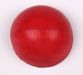 Stuart Surridge, a half section of cricket ball, the interior marked Stuart Surridge  7cm