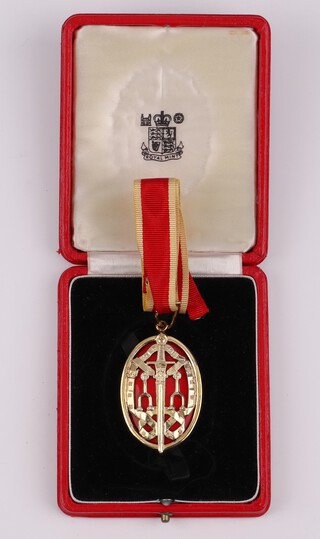 Sir Barnes Wallis, a Knight Bachelor's second type silver gilt neck badge with Royal Mint Hallmark in fitted red case (Wallis was knighted on December 10th 1968), together with a red cloth bound volume listing Knight Batchelor recipients from 1965-1973, 8vo, 193pp. and a Guardian Newspaper from June 8th 1968 announcing the Birthday Honours list. 
