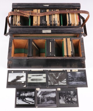 A collection of Barnes Wallis' lecture slides mainly about airships in fitted numbered wooden boxes (88 slides, in two boxes)
Black Box, Graphs (crossed out in red), 27 slides (4 cracked) 
Staring at the two-holes end:
Section A: 11 slides (1 cracked), two diagrams of airships, two tables and a list of WW2 shipping data, a table of rocket propellant performance, two photos of girders, three slides of text, equations and table 
Section B: 10 slides (2 cracked), 7 diagrams relating to the performance of airships, three photos of the construction of R100 
Section C: 4 slides, 2 diagrams relating to airships, 1 photo ditto, 1 world map showing trade 
Section D: 8 slides (1 cracked), 1 diagram and 5 photos of the construction of the R100, 1 diagram and photo of the Graf Zeppelin 
Box 1, Current Lecture, 61 slides (slides are not completely in order; 2 cracked slides)
From "Start Here" label:
Section A: 16 slides showing world maps and diagrams of airships for long-distance travel 
Section B: 19 slides (1 cracked) showing the early development of long-distance Zeppelins (Germany to America) compared with British dirigibles and the late development of British airships, culminating with the R100 
Section C: 18 slides showing the construction of the R100, the development of BOAC routes around the world, the long-distance Vulcan bomber and an image of the swing-wing Swallow 
Section D: 8 slides (1 cracked) showing the potential of supersonic travel 