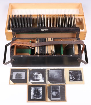 A collection of Barnes Wallis' lecture slides mainly about Dam Busters, bombs  and targets in fitted numbered wooden boxes (81 slides in two boxes)
Box W, 40 slides (5 slides cracked), box marked in chalk into four sections 
Section A: Four miscellaneous diagrams, one miscellaneous photo, two photos of original, almost spherical bouncing bomb 
Section B: Five photos, five drawings and a map relating to the Ruhr dams and the Dam Busters 
Section C: 14 photos of 617 Squadron's targets, some destroyed (including Tirpitz upside-down), a photo of a Tallboy bomb and two drawings relating to the Tallboy 
Section D: Five photos relating to the Ruhr dams and the bouncing bomb 

Box D, Diagrams, 41 slides 
Slides 1-26 Aerodynamics 
Slides 28-31 Stratospheric chamber 
Slides 33-34 Diagram, photo and blueprint of a German dam, possibly Mohne 
Slides 36-38 Diagrams of Tallboy effect on Bielefeld viaduct 
Slides 40-45 Diagrams for bombing coal mines, oil storage depots, tunnels, railway cutting or embankment 
