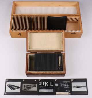 A collection of Barnes Wallis' lecture slides mainly about Seaplanes and other Aircraft in fitted numbered wooden boxes (90 photos, in 2 boxes)
Box N, Graphs, 24 slides 
Batch 1 (slides 1-13) - Aeronautical data for aircraft and pilot (slide 1 cracked). 
Batch 2 (slides 16-26) - Properties of materials under stress or temperature. 
Loose- Many unmounted photos of seaplanes and aircraft 1920's to late 1930's. 

Small Box S, Misc. Aircraft, 46 slides 
Starting at labelled end: 
5 photos of Supermarine S.6 sea plane which set speed record in 1929, 4 photos of civil single-seater aircraft, 7 photos of a WW2 military 2-seater, 4 photos of Hurricanes, 26 photos of aircraft structure 
