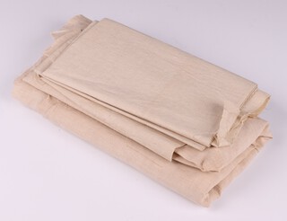 Two sections of undoped linen possibly from an Airship stored in a brown envelope addressed to Sir Barnes Wallis' home address and postmarked Chichester November 1971 hand written to verso R100 fabric before 'doping' (not from drawers) 77cm x 75cm and 111cm x 189cm  with sewn name tag M.F.Wallis (both cut)
