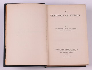 WATSON, W.  A Text-Book of Physics.  London: Longmans, Green, and Co.  8vo, 896pp.  Original blue cloth, gilt lettered spine.  Fading to spine and cover, rubbing to corners and edges, spine in poor condition, loose front page.   dedicated "B.N.Wallis 8/6/21 from J M Bond 1900 With all good wishes" 