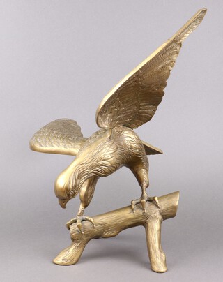 A brass figure of an eagle with outstretched wings 54cm h x 63cm w 