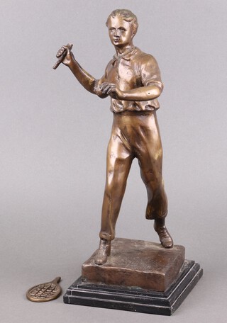 An Art Deco style bronzed figure of a standing tennis player, raised on a black marble base 40cm h (racket a/f)
