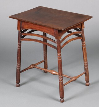 An Art Nouveau rectangular beech occasional table raised on turned supports 62cm h x 57cm w x 39cm d 