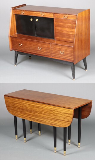 G-Plan, a 1950's Librenza dining room suite from the Tola & Black range, designed by E Gomme, comprising sideboard with raised back fitted a drawer above cupboard enclosed by a sliding panelled door with cocktail unit to the side above 1 long and 1 short drawer, raised on outswept supports 96cm h x 131cm w x 50cm d, together with a drop flap dining table 73cm h x 152cm l x 46cm w and 4 dining chairs 