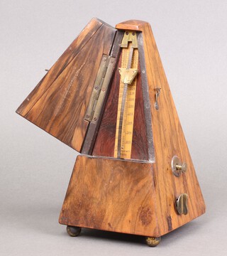 R Crocks & Co., a metronome in a walnut case