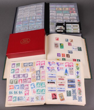 A Simplex album of mint and used British and world stamps, a stock book of used GB stamps and a blue album of used world stamps 