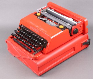 An Olivetti Valentine portable manual typewriter complete with carrying case 