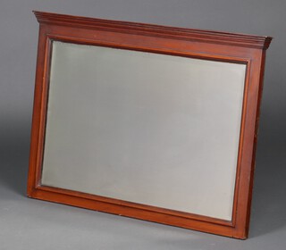 An Edwardian rectangular bevelled plate wall mirror contained in a walnut frame 51cm x 84cm
