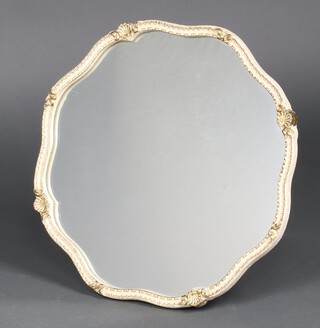An octagonal plate wall mirror contained in a Louis style frame 47cm 