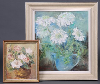 P H Lauwerijssen, Belgian school, oil on canvas signed, still life study of a vase of chrysanthemums 49cm x 43cm, the reverse with Bruges Gallery label, together with a still life study of a vase of roses 28cm x 24cm, the reverse written Brugge 1968