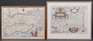 A 1970 reproduction coloured print of Saxtons map of Kent and Sussex 42cm x 57cm and ditto 1960 Saxtons map of Cornwall 36cm x 37cm, both contained in oak frames