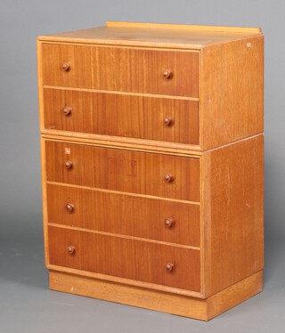 Meredew, a mid-century teak chest with raised back above 5 drawers with turned handles, 106cm h x 76cm w x 46cm d (sun bleached in places)