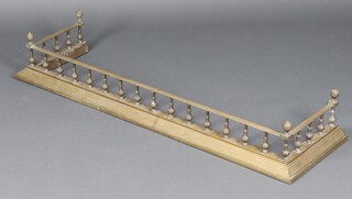 A brass raised fire curb 19cm h x 130cm w x 38cm d 