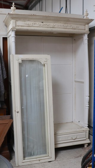 A 19th Century white painted armoire enclosed by arch glazed panelled doors 237cm h x 142cm w x 63cm d (requires bolts)  