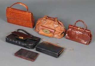 Two crocodile handbags together with a collection of other handbags