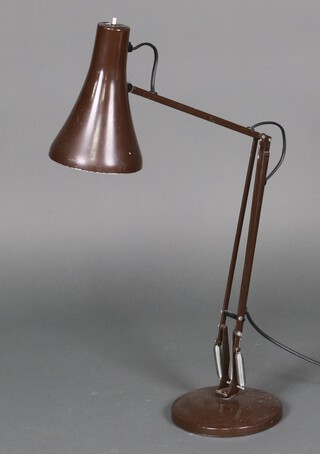A brown anglepoise table lamp on a circular base 82cm h x 18cm diam. 