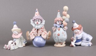 Four Lladro figures of clowns - Littlest Clown 5811, Having a Ball 5813, Pierrot with Puppy and Ball 5278 and Pierrot Clown with Puppy 5277 