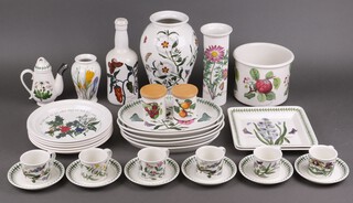 A Portmeirion Botanic pattern vase and cover, ditto vase, jardiniere, oil bottle, 5 oval platters, 2 square platters, 6 cups and 6 saucers, together with 5 Portmeirion plates decorated holly 