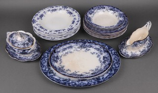 A 15 piece Cheswick pattern dinner service comprising 2 oval meat plates (1 with crazing), sauce boat (cracked) and stand, sauce tureen and cover (cracked), 6 large soup bowls (3 cracked), 3 small soup bowls (1 cracked) and 6 Furnivals Melville soup bowls (3 cracked) 